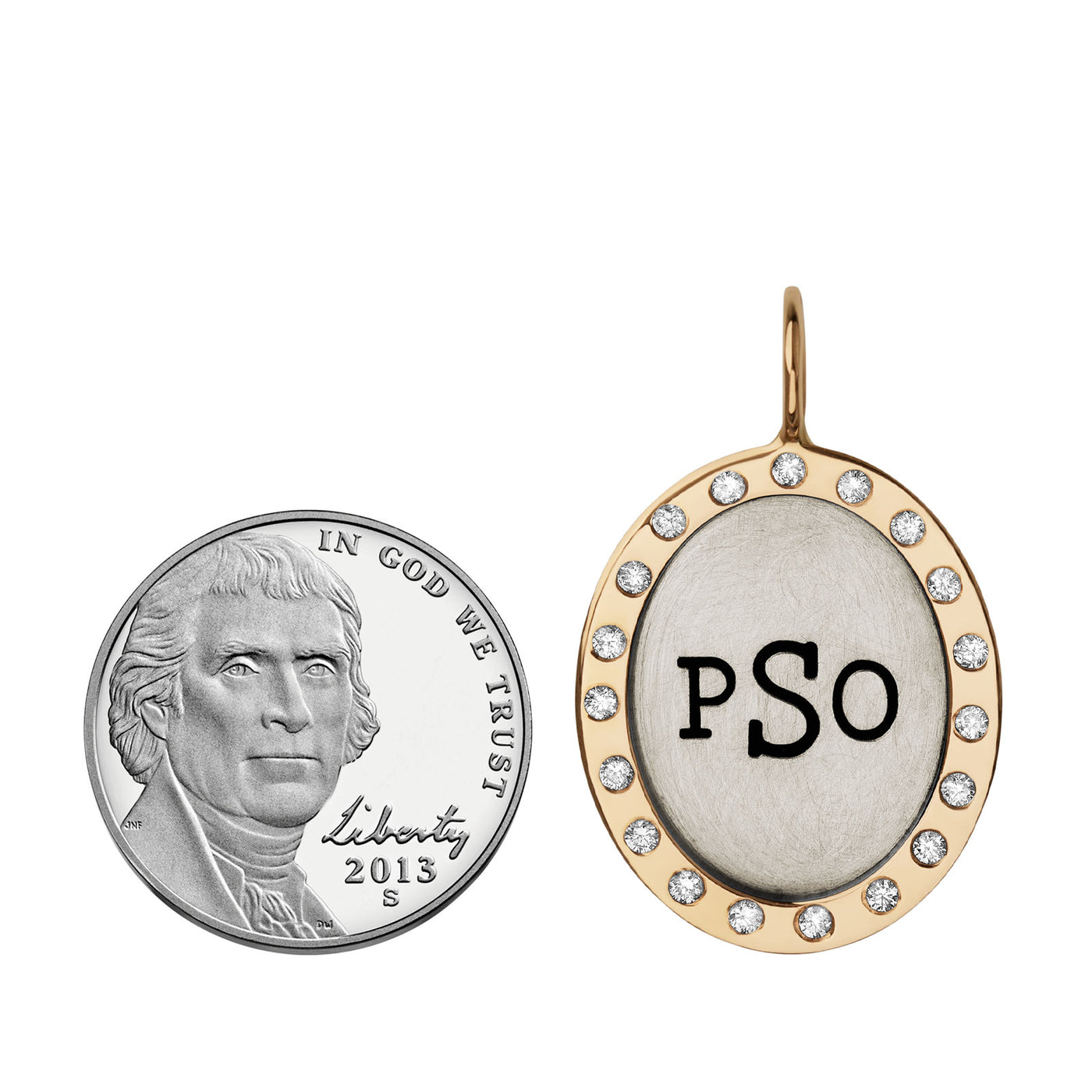 Oval charm size compared to a quarter